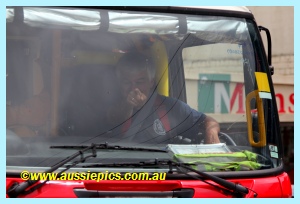 Bruce in the Drouin West Fire Brigade tanker. Bruce in the Drouin West Fire Brigade tanker.