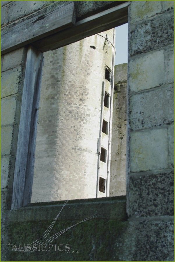 Looking at one tower through the dairy window.